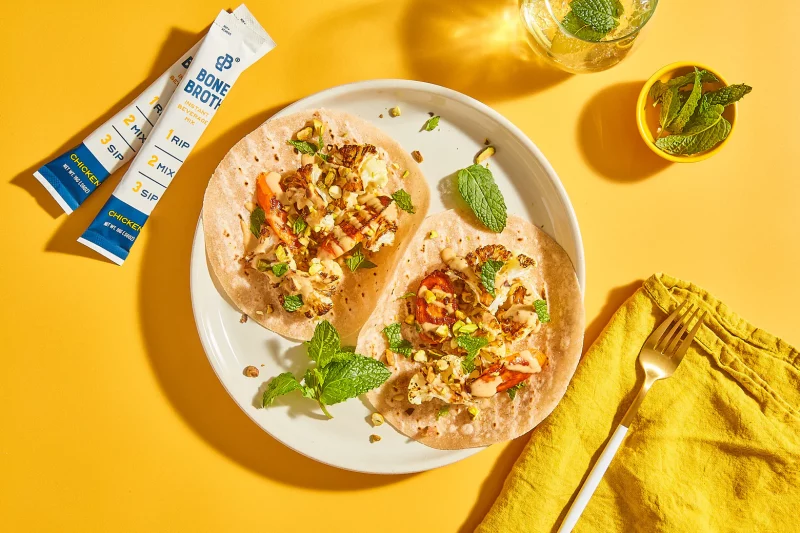 Roasted Root Veggie Tacos with Lemon Tahini Drizzle by Bare Bones - FoodSocial