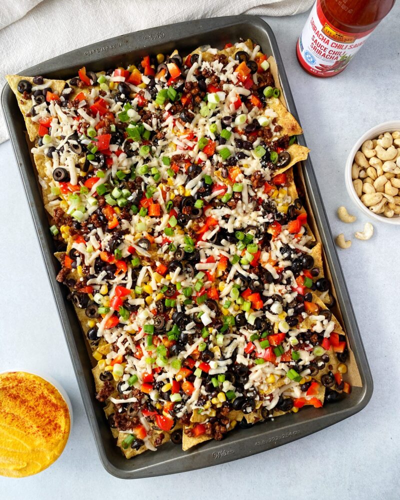 Vegan Nachos with Sriracha Chili Cheese Sauce by Riri's Recipes - FoodSocial