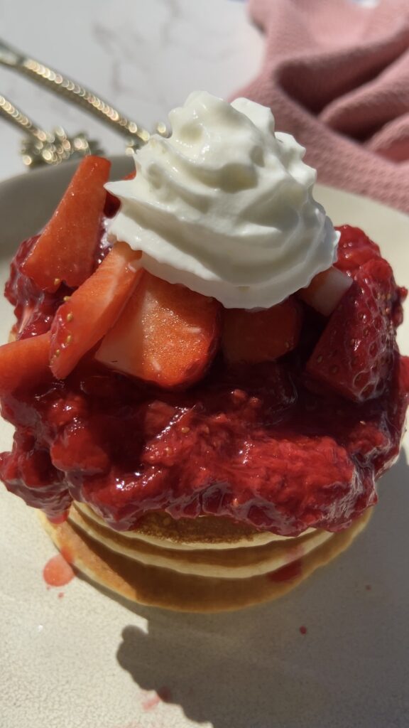 Strawberry Cheesecake Protein Pancakes by Chenoa Hill - FoodSocial