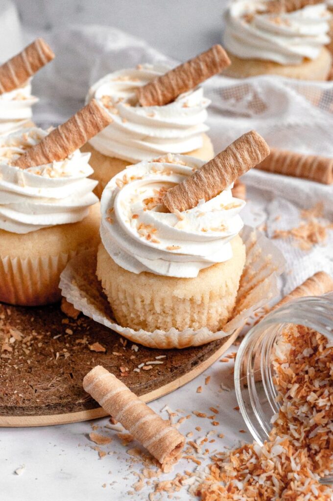 Gluten-Free Coconut Cupcakes (Dairy-Free) by Caked By Katie - FoodSocial