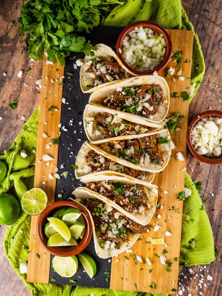 Slow Cooker Barbacoa Beef Tacos by scarlatifamilykitchen - FoodSocial