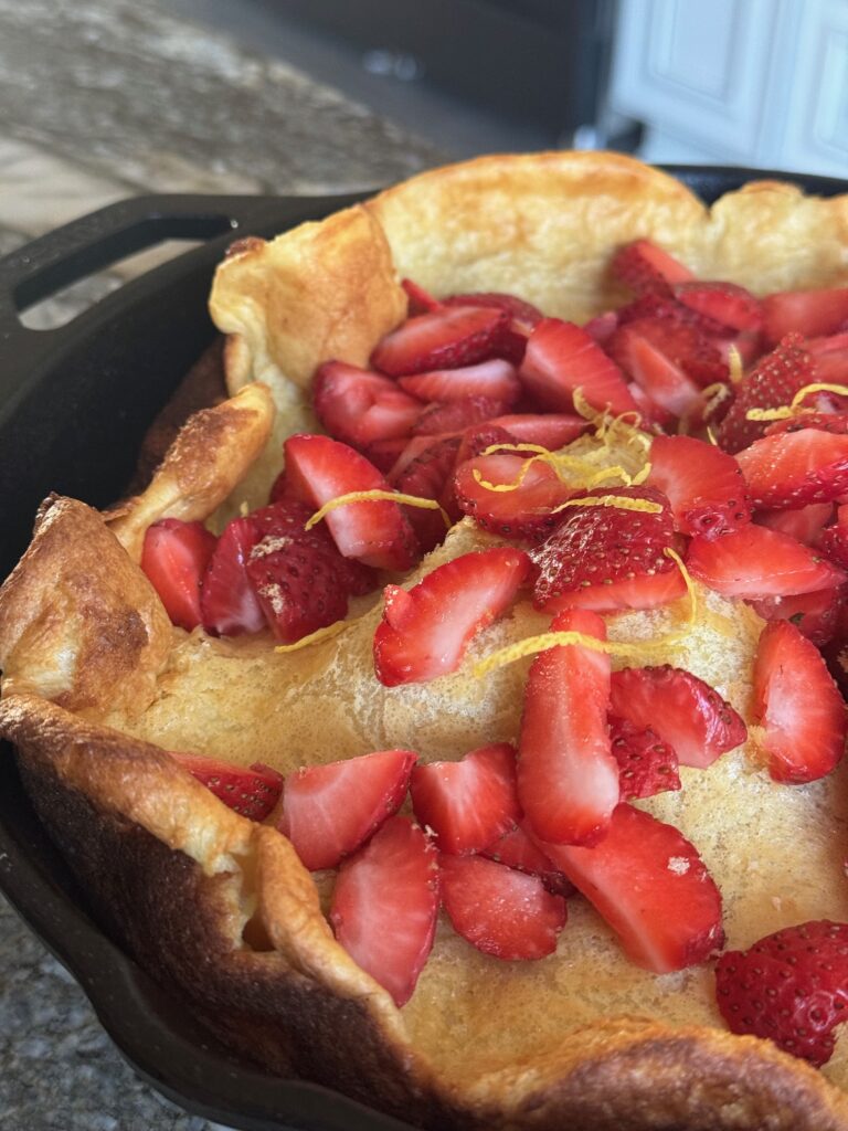 Cast Iron Skillet Strawberry Lemon Dutch Baby by Tasha Tindall - FoodSocial