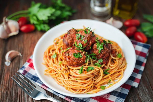 Slow Cooker Cheese Stuffed Meatballs and Sauce by Bachman Family Farms - FoodSocial