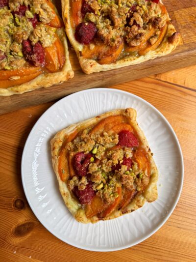 Apricot & Raspberry puffs with pistachio streusel topping