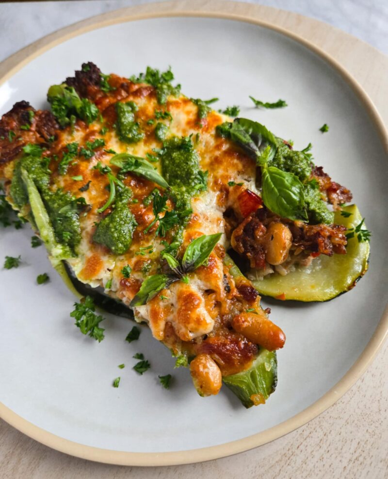 Cheesy Stuffed Zuccs with Pesto by the_happy_veg - FoodSocial