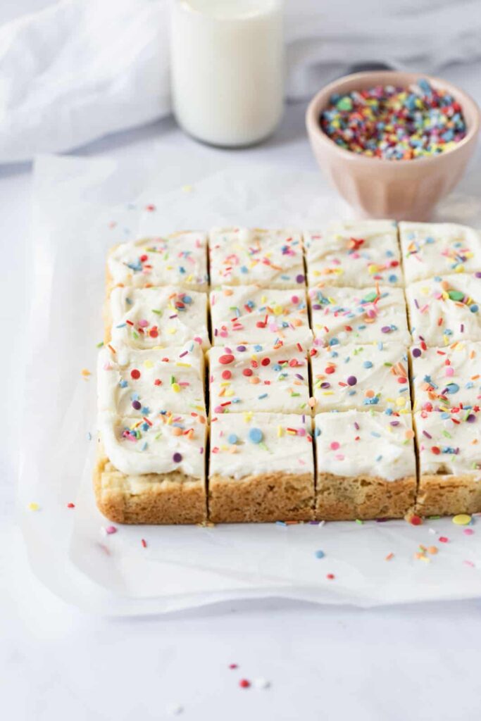 Frosted Sugar Cookie Bars by The Sweet Occasion - FoodSocial
