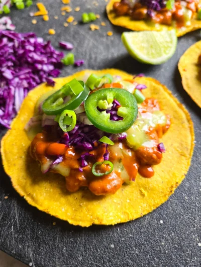 Cheesy Enchilada Bean Tostadas