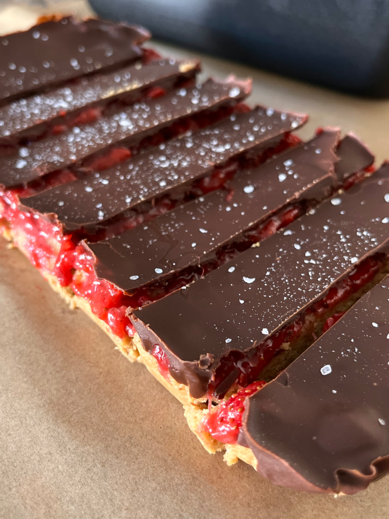 Peanut Butter and Jelly Protein Bars by Samantha Monti - FoodSocial