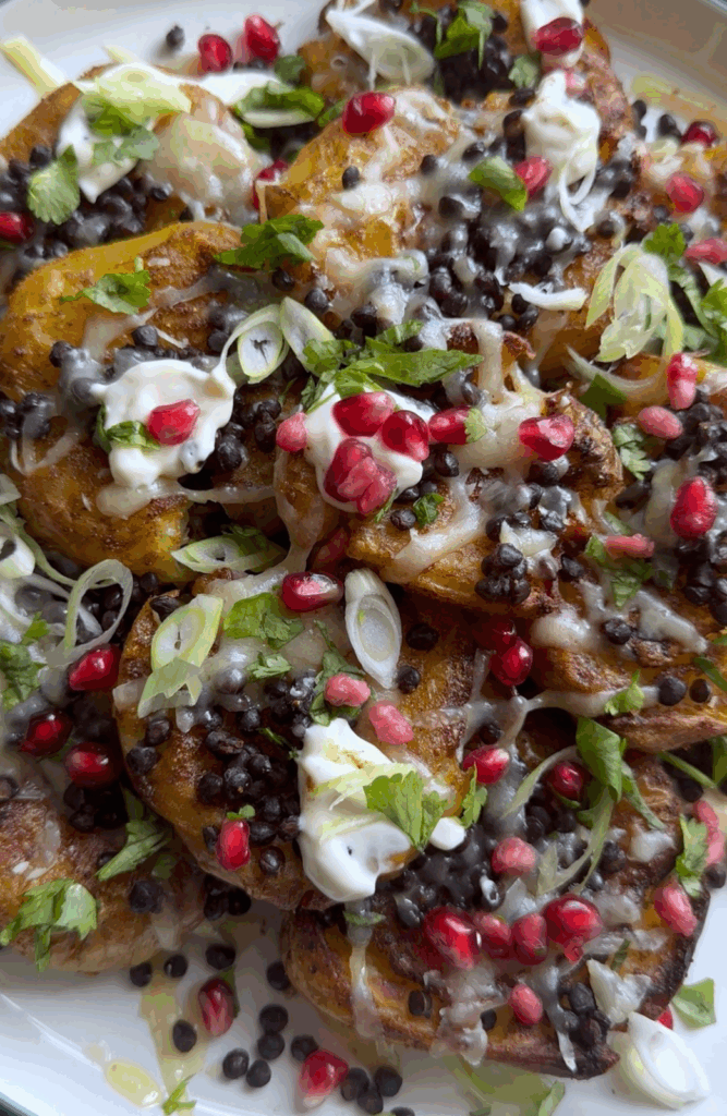 Masala Cheesy Lentil Smashed Potatoes by Nicole Derdabi - FoodSocial