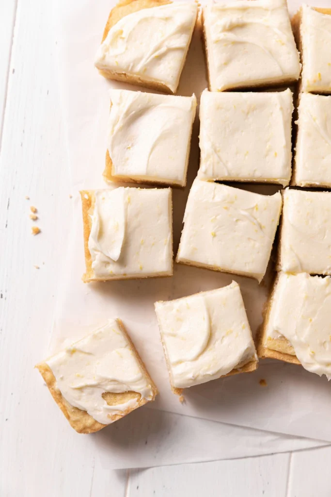 Frosted Lemon Sugar Cookie Bars by The Sweet Occasion - FoodSocial