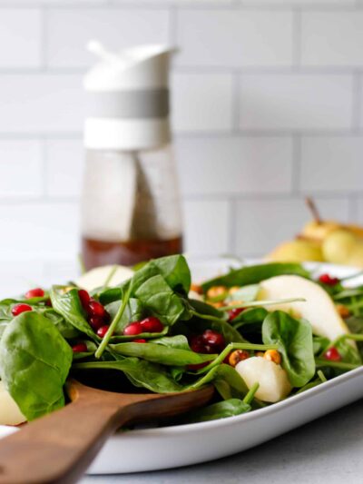 Spinach and Pear Salad with Crispy Chickpeas and Cinnamon Maple Vinaigrette