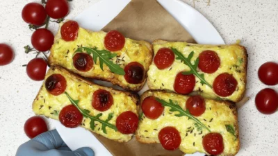 Baked Buns with Brie, Caraway, and Cherry Tomatoes