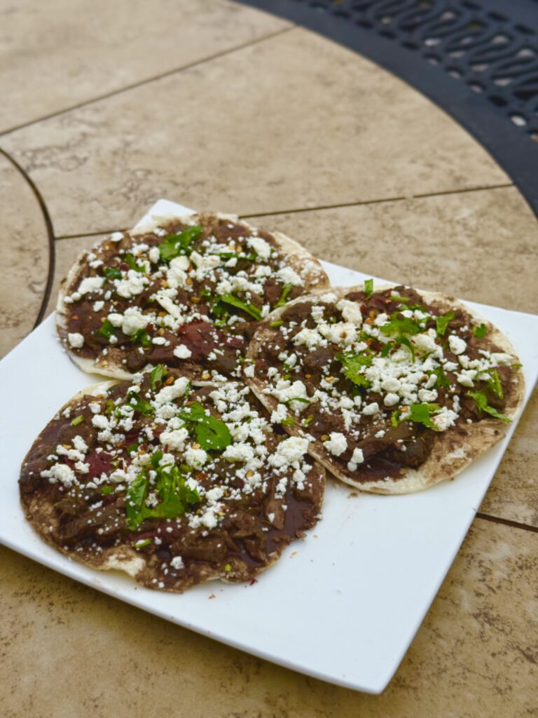 mole chicken street tostadas by ericatangeman - FoodSocial