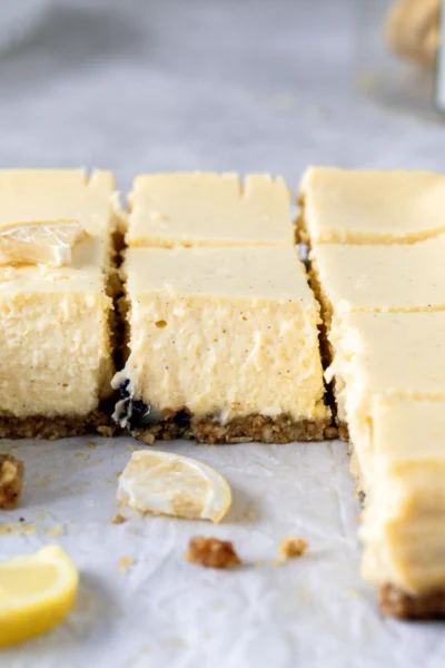 Zesty Lemon Curd Cheesecake Bars with Blueberry Granola Crust