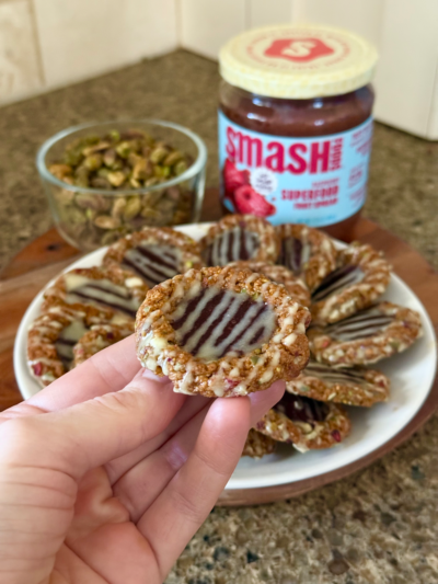 white chocolate, pistachio, & raspberry thumbprint protein cookies
