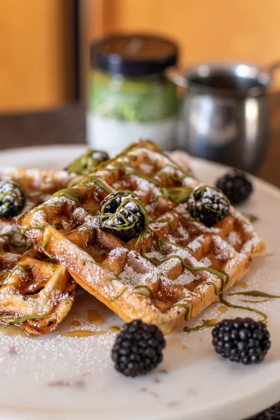 Banana Protein Waffles with Pistachio Drizzle