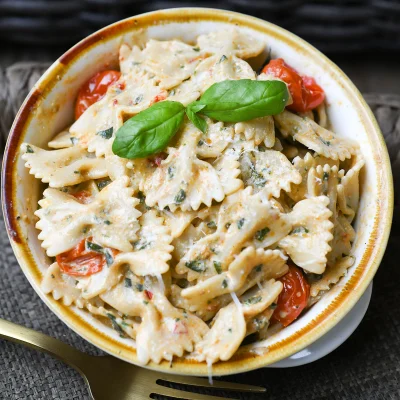 Spicy Creamy Basil Pesto Pasta with Roasted Cherry Tomatoes