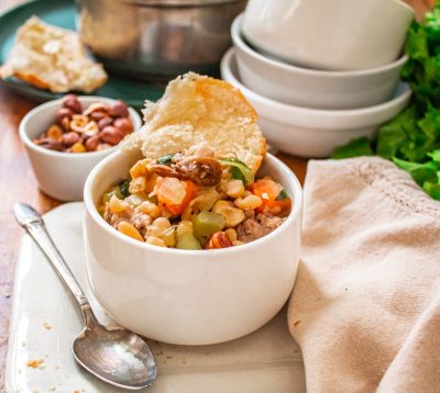 Sausage, Escarole, and White Bean Soup with Mushrooms